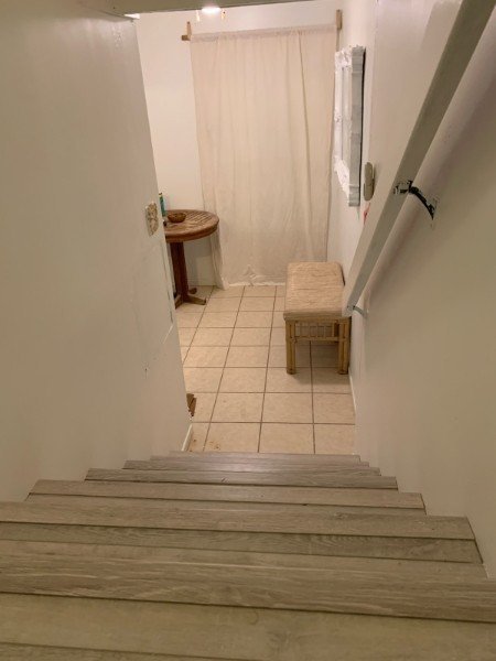 Bedroom with French doors to lanai
