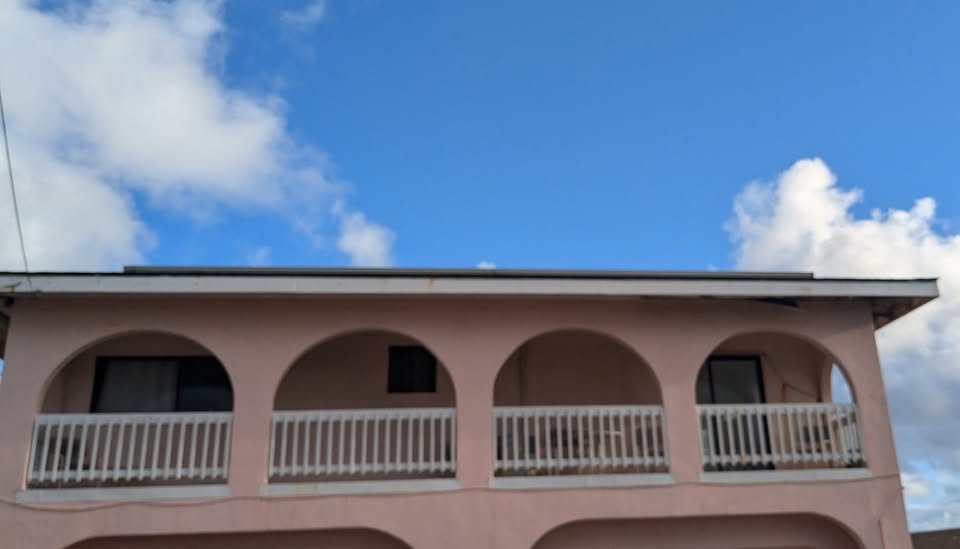 Building exterior with arched lanai
